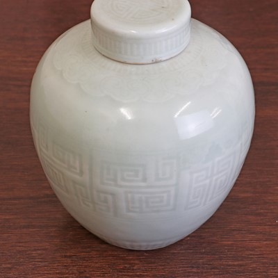 Lot 168 - A pair of Chinese celadon jars and covers