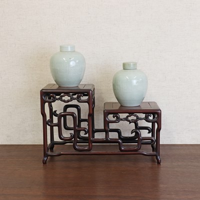 Lot 168 - A pair of Chinese celadon jars and covers