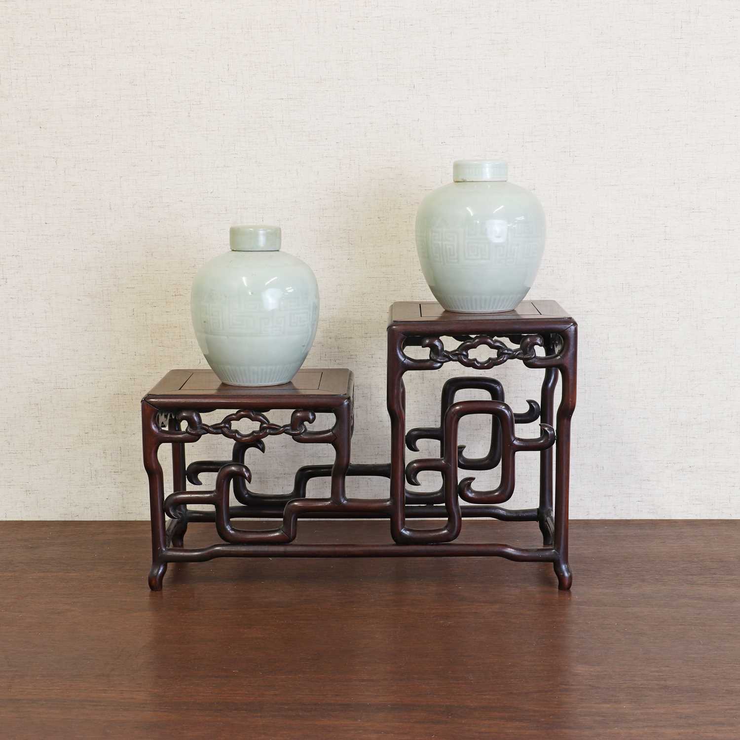 Lot 168 - A pair of Chinese celadon jars and covers