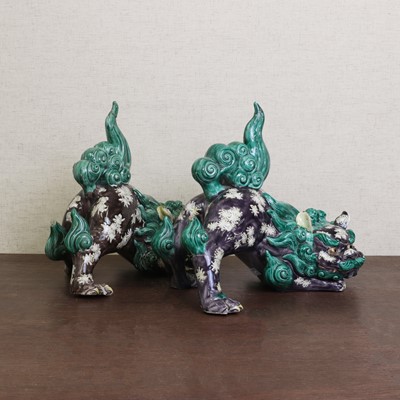 Lot 181 - Two Chinese sancai-glazed Buddhist lions