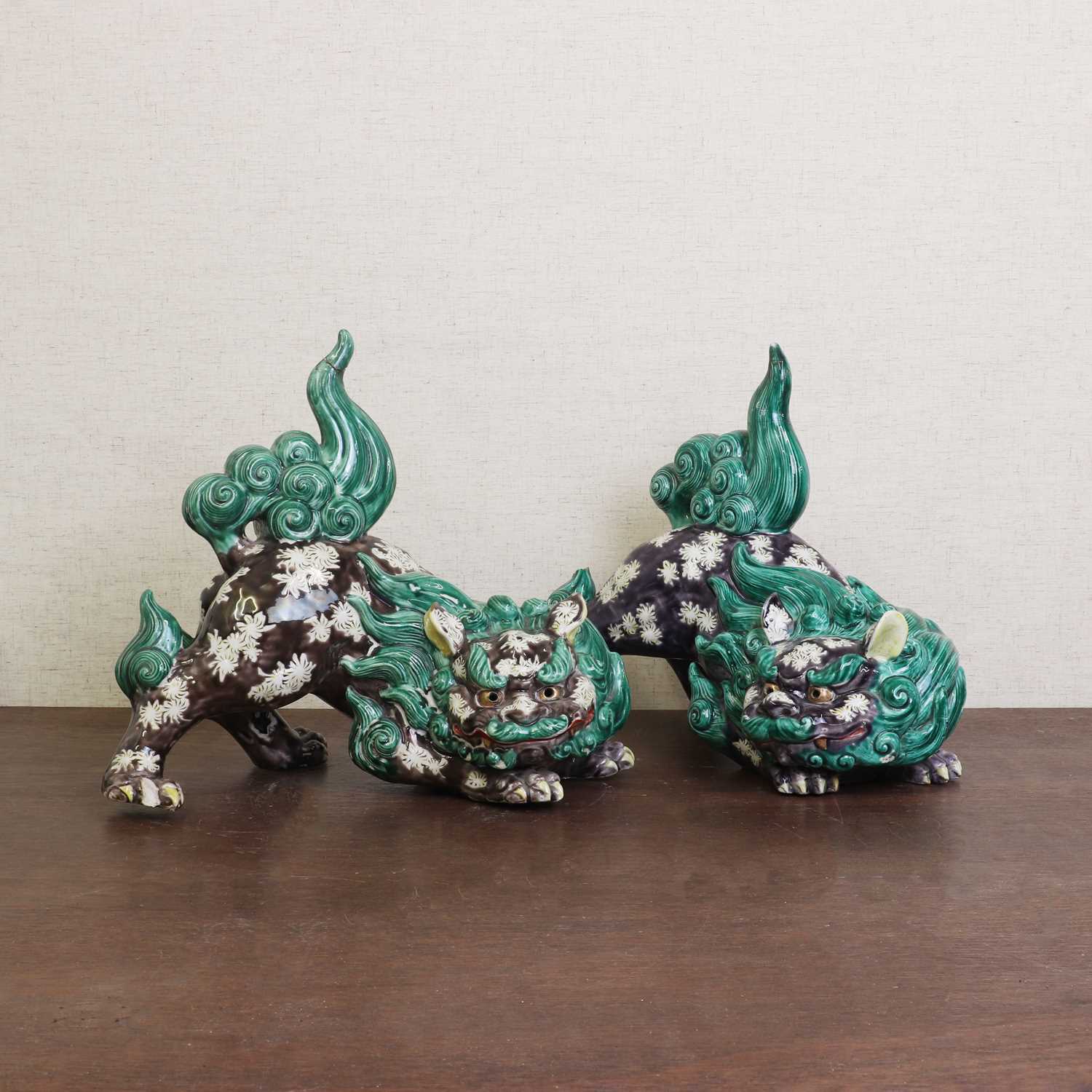 Lot 181 - Two Chinese sancai-glazed Buddhist lions