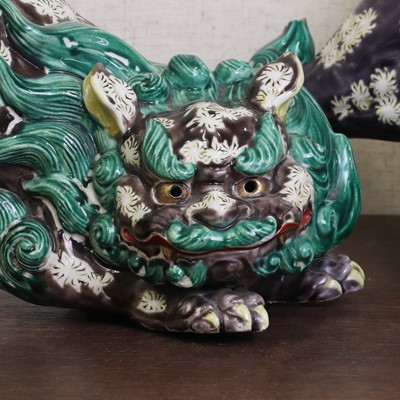 Lot 181 - Two Chinese sancai-glazed Buddhist lions