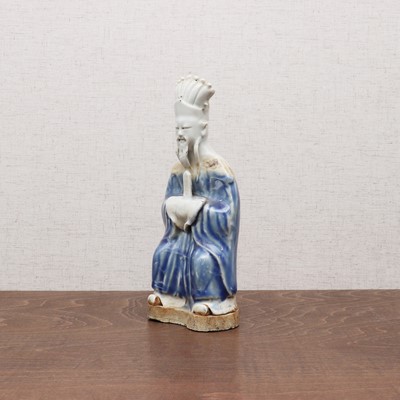Lot 190 - A Chinese porcelain figure