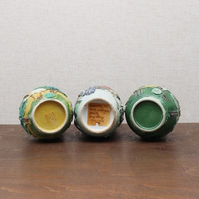Lot 196 - A pair of Chinese carved porcelain jars and covers
