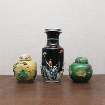 Lot 196 - A pair of Chinese carved porcelain jars and covers
