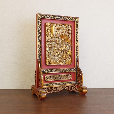 Lot 187 - A Chinese gilt lacquered wood table screen