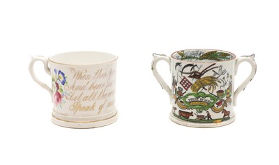 Lot 212 - A Victorian Staffordshire pottery twin-handled mug