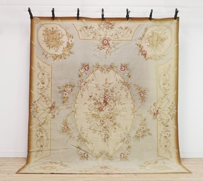 Lot 379 - A needlepoint rug of Aubusson design