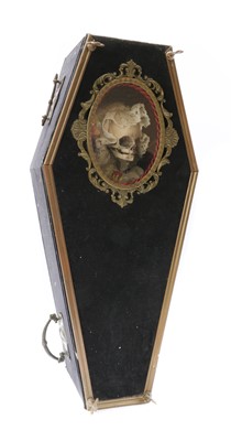 Lot 57 - A model child's skeleton in a coffin