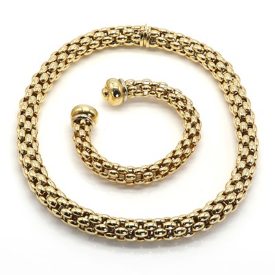 Lot 162 - An 18ct two colour gold necklace and torque bangle matched 'Flex-it Diva' suite, by Fope c.1990