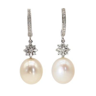 Lot 202 - A pair of 18ct white gold, cultured freshwater pearl and diamond drop earrings