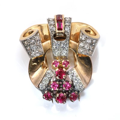 Lot 48 - A gold diamond and synthetic ruby set single clip brooch, c.1950