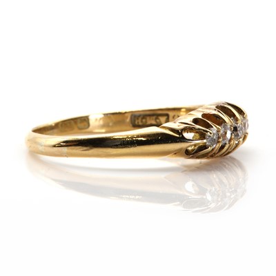 Lot 46 - An 18ct gold five stone diamond ring