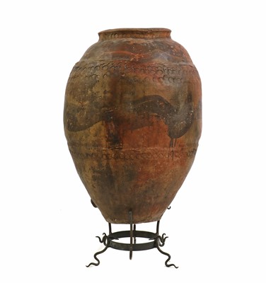 Lot 404 - A large painted terracotta oil pot