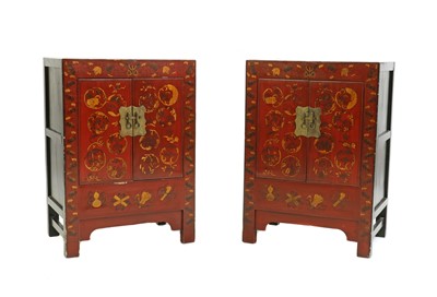 Lot 398 - A pair of red lacquered Chinoiserie bedside cabinets