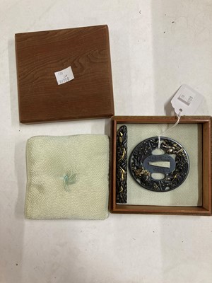 Lot 90 - A Japanese bronze tsuba and a kozuka