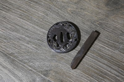 Lot 90 - A Japanese bronze tsuba and a kozuka