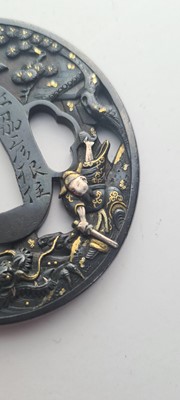 Lot 90 - A Japanese bronze tsuba and a kozuka
