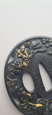 Lot 90 - A Japanese bronze tsuba and a kozuka