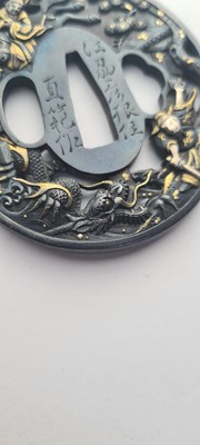 Lot 90 - A Japanese bronze tsuba and a kozuka