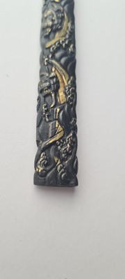 Lot 90 - A Japanese bronze tsuba and a kozuka