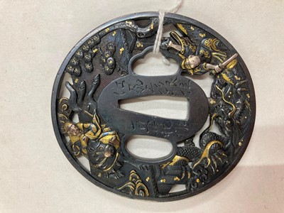 Lot 90 - A Japanese bronze tsuba and a kozuka