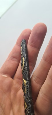 Lot 90 - A Japanese bronze tsuba and a kozuka
