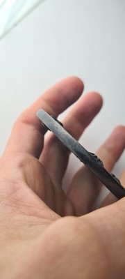 Lot 90 - A Japanese bronze tsuba and a kozuka