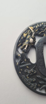 Lot 90 - A Japanese bronze tsuba and a kozuka