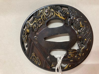 Lot 90 - A Japanese bronze tsuba and a kozuka