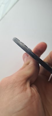 Lot 90 - A Japanese bronze tsuba and a kozuka