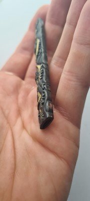 Lot 90 - A Japanese bronze tsuba and a kozuka