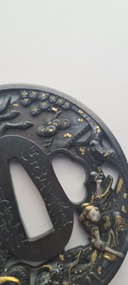 Lot 90 - A Japanese bronze tsuba and a kozuka