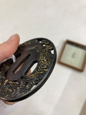 Lot 90 - A Japanese bronze tsuba and a kozuka