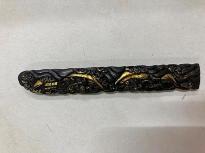 Lot 90 - A Japanese bronze tsuba and a kozuka