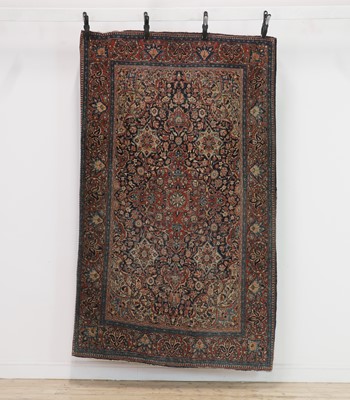 Lot 374 - A Kashan wool rug