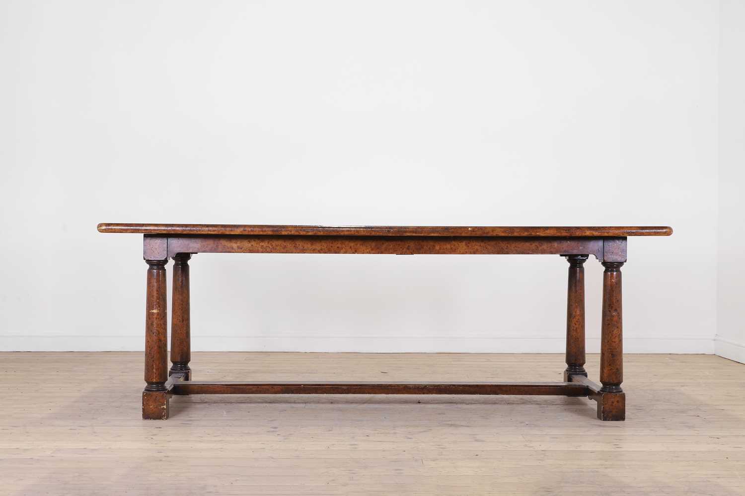 Lot 396 - A pollard oak refectory table by Theodore Alexander