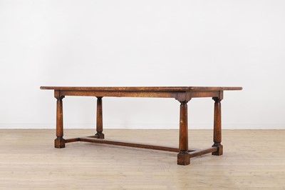 Lot 396 - A pollard oak refectory table by Theodore Alexander