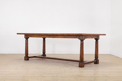 Lot 396 - A pollard oak refectory table by Theodore Alexander