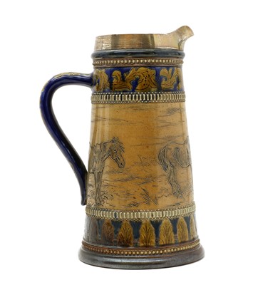Lot 206 - A silver mounted Doulton Lambeth stoneware jug
