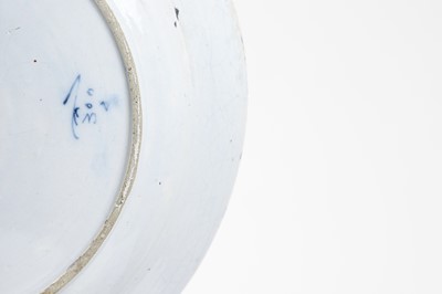 Lot 324 - A blue and white delft charger