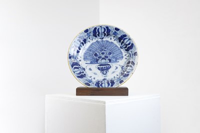 Lot 324 - A blue and white delft charger