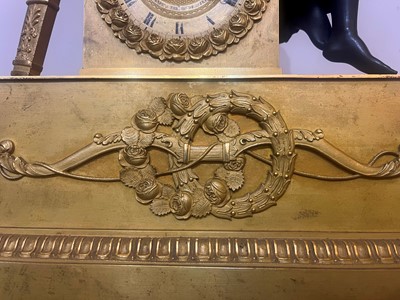 Lot 132 - An Empire ormolu mantel clock