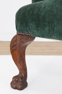 Lot 48 - A George II-style walnut wingback armchair