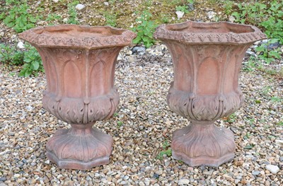 Lot 455 - A pair of Gothic style terracotta urns