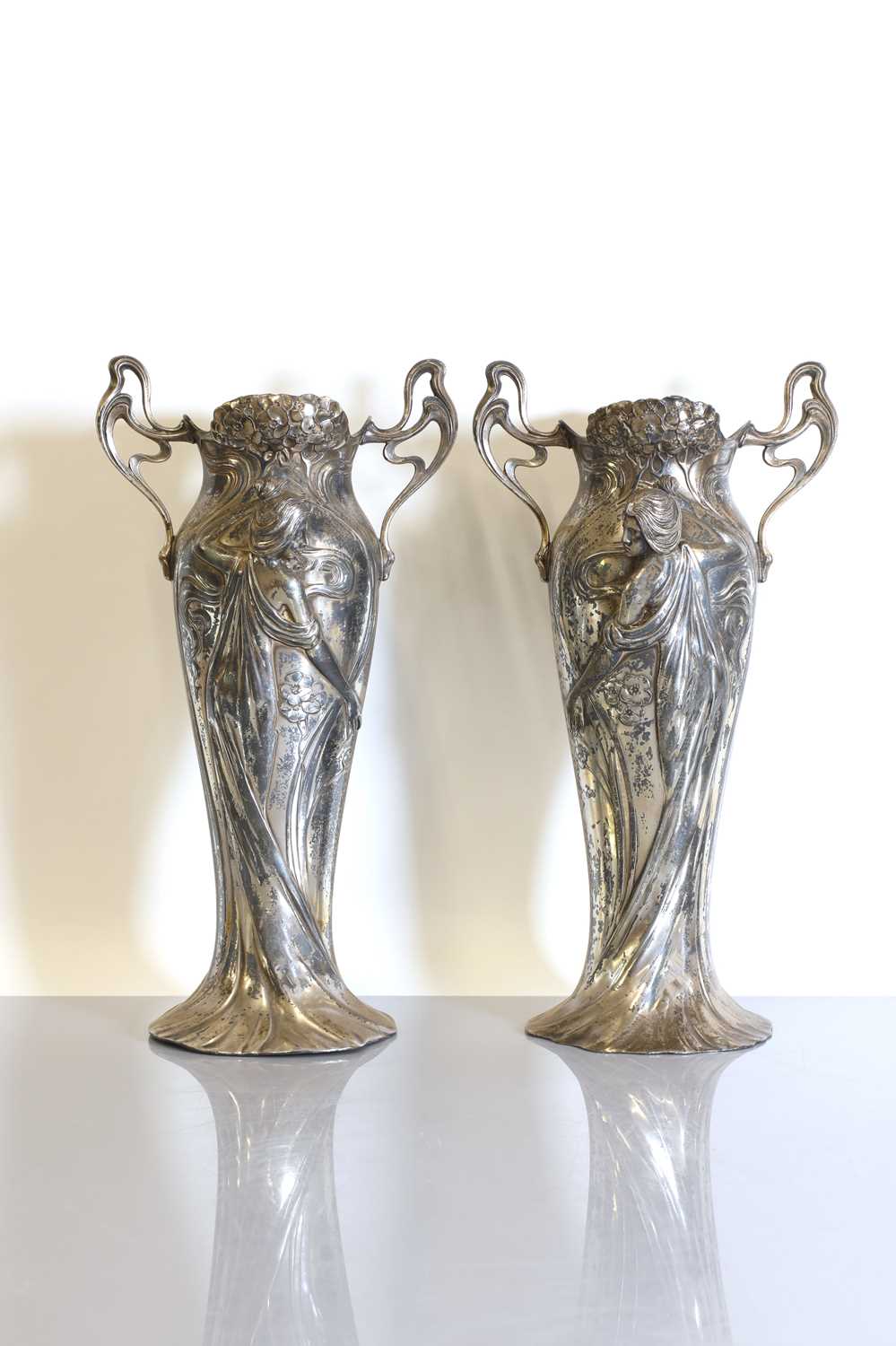 Lot 114 - A pair of silvered German Art Nouveau vases