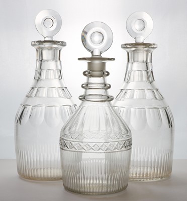 Lot 228 - A group of three Regency glass decanters