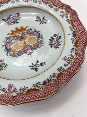 Lot 69 - An export armorial porcelain part dinner service