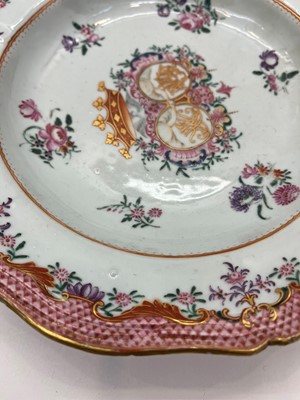 Lot 69 - An export armorial porcelain part dinner service