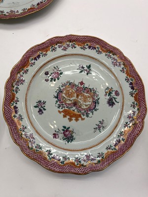 Lot 69 - An export armorial porcelain part dinner service